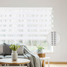 Traditional window blinds with cords still provide reliable light and privacy control.